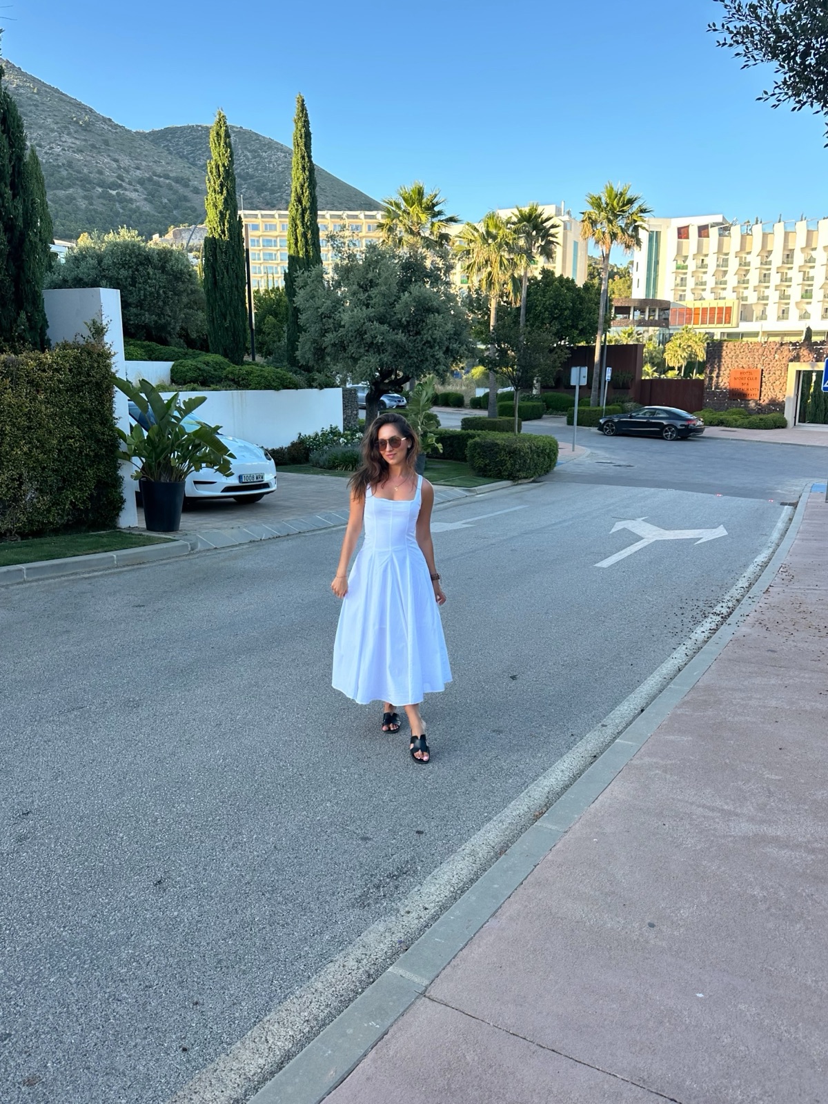 Fashion content, white dress in Marbella